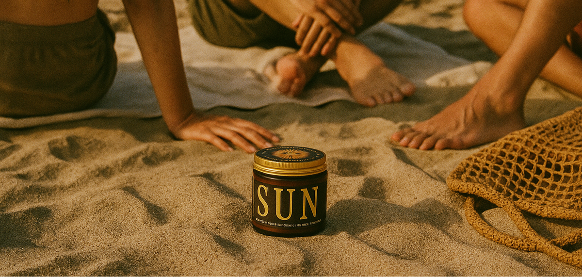 Jar labeled 'SUN' on sand with people sitting on beach